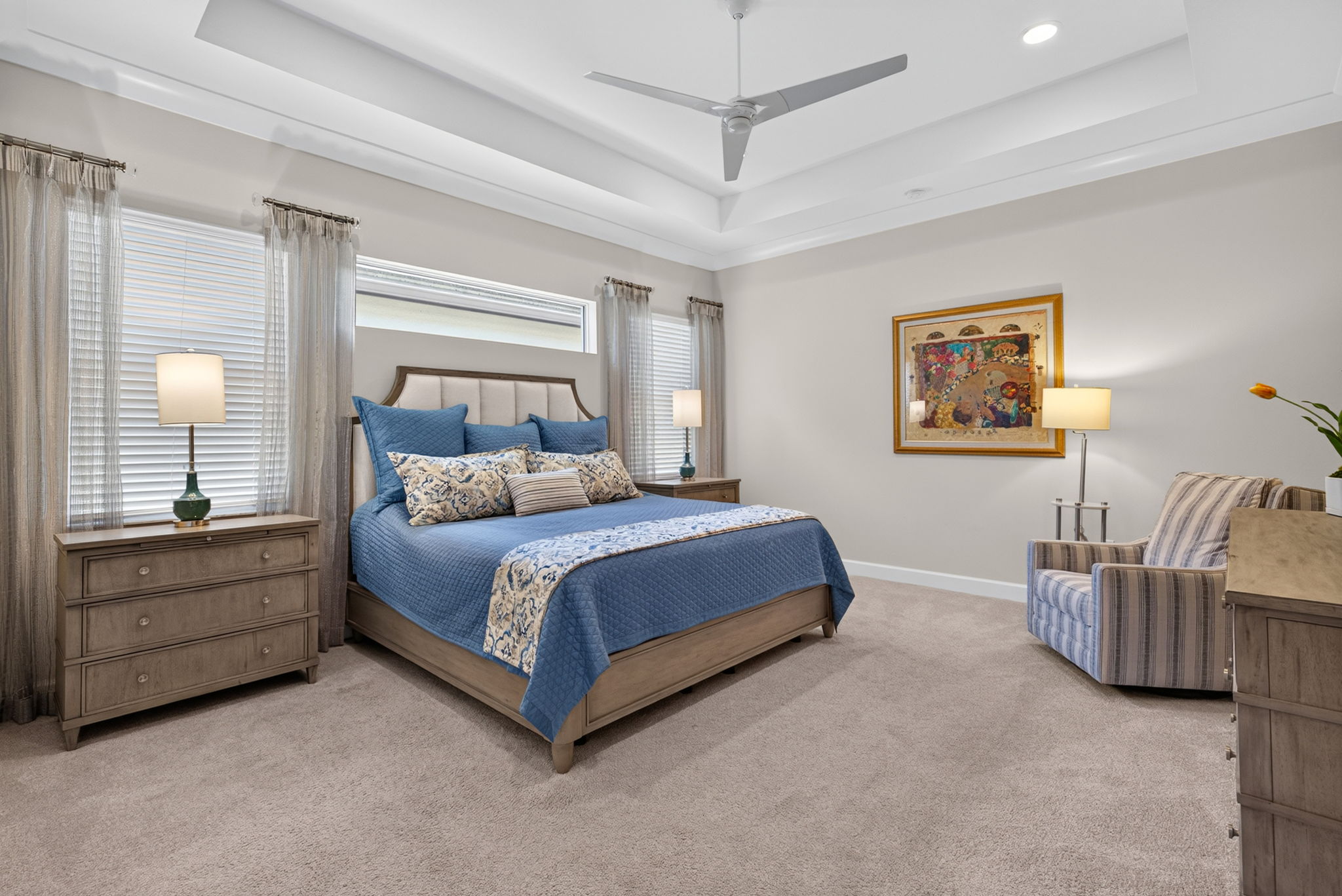 Tray ceiling, crown molding, fits a king bed, chair, and dressers, too!