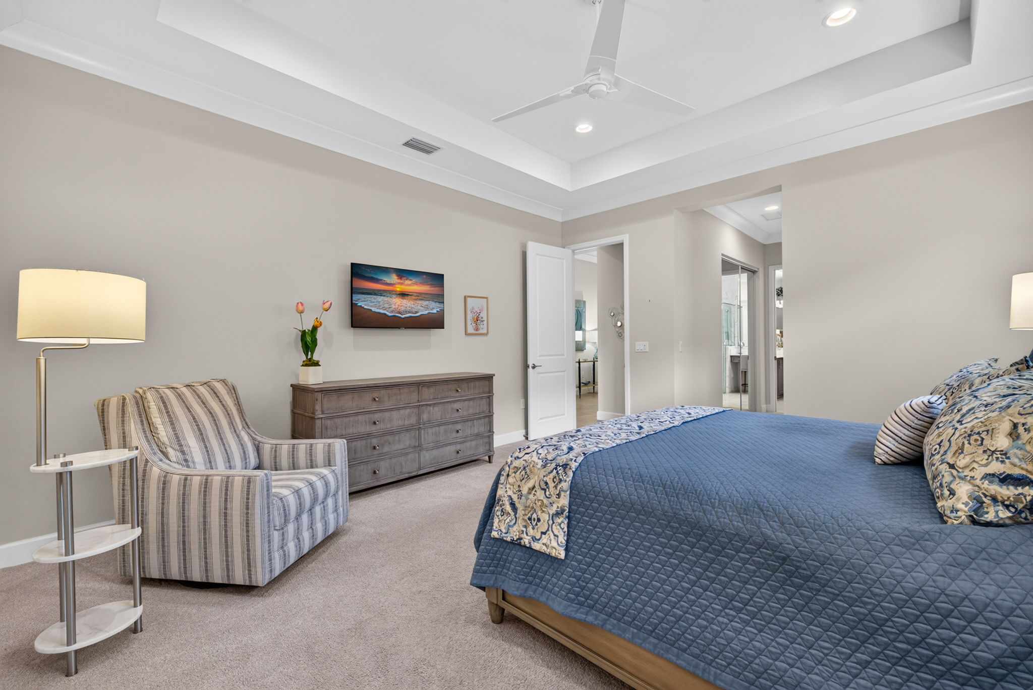 Located just of the foyer, the primary bedroom is spacious and welcoming. See the mirrored 2nd closet?