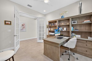 Note the art deco French doors! This 3rd bedroom is located in the middle of the home.