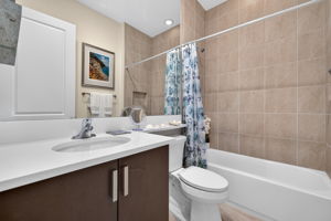 2nd full bath for guests. Floor to ceiling shower tile upgrade present here!