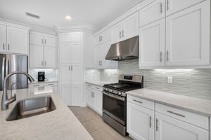 Gas cooking!!! Reverse osmosis water filtration system, abundance of cabinets (soft close drawers), under cabinet lighting, French door fridge all here!