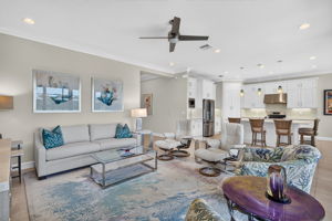 This floor plan is great for entertaining! Artwork above sofa, sofa, and 2 swivel chairs to covey. See furniture list for all inclusions.