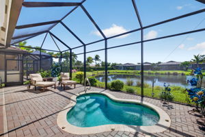 Enjoy this heated, inground home spa with an expansive lake view!!! The community also offers a heated resort sized pool with "beach" access and steps, heated resistance pool, heated lap pool, and a heated grandkids pool.