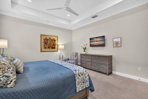 Wait until you see the walk-in closet with custom shelving and a space saving pocket door!