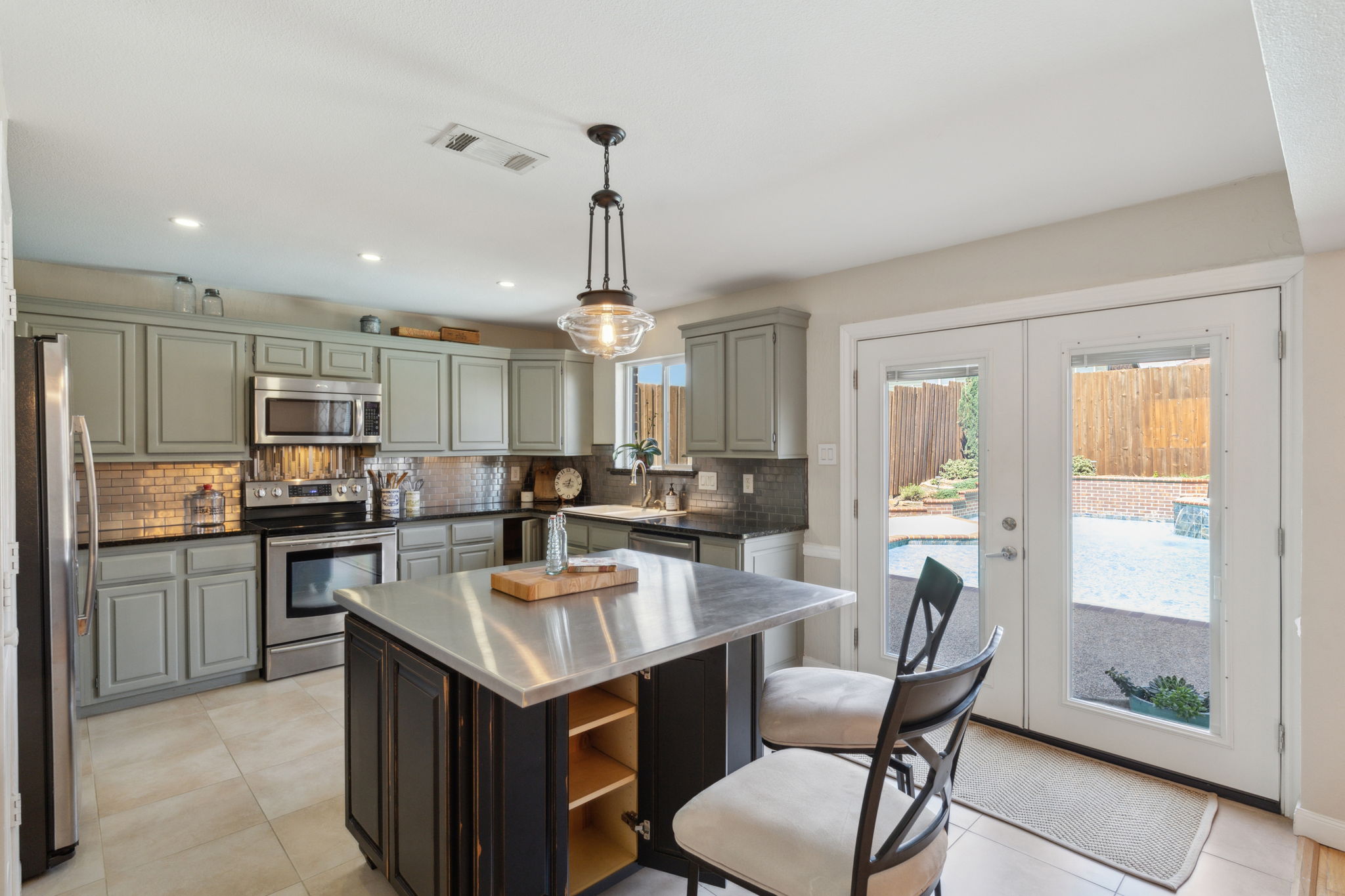 This view of the Gourmet Kitchen shows off the added storage (both sides of the island) as well as the corner Kitchen cabinets.