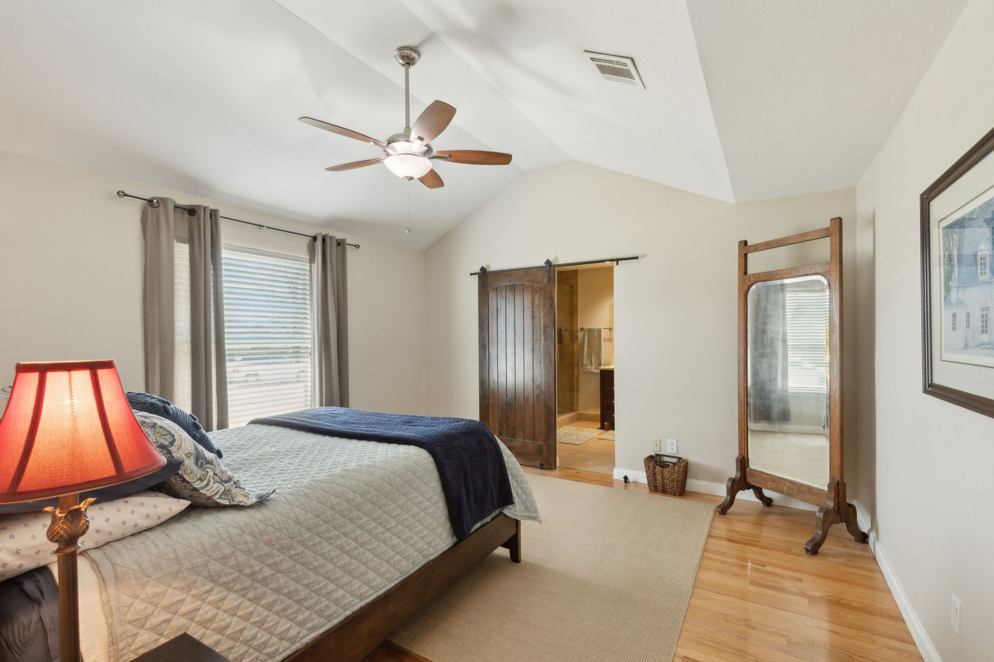And now to the AMAZING Master Suite!  Both warm and inviting as well as private and serene, this master bedroom is the perfect place to relax at the end of the day.  The lovely barn door leads to the designer ensuite!