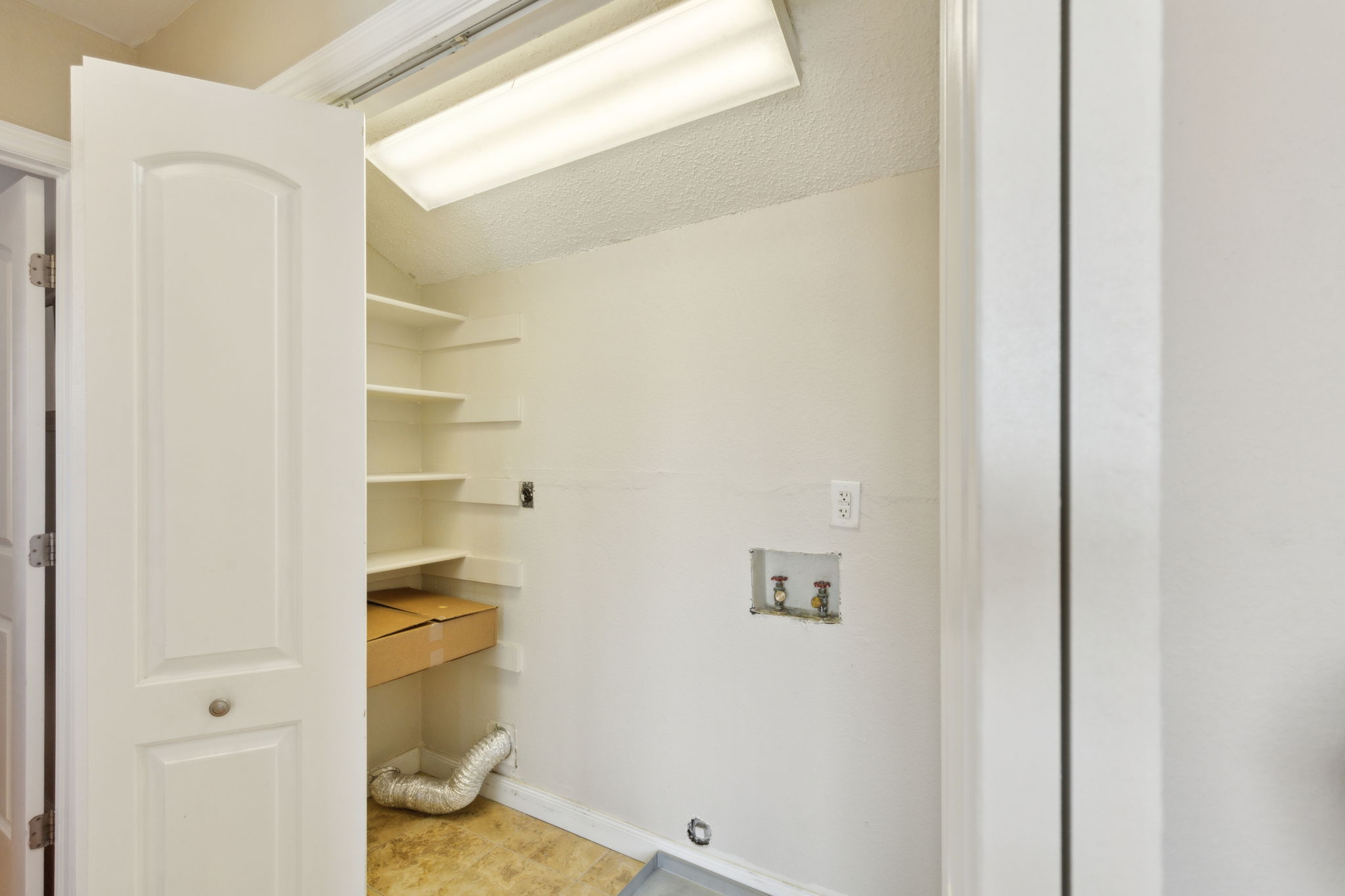 The full size laundry area is tucked away, but still close to all three of the upstairs bedrooms!