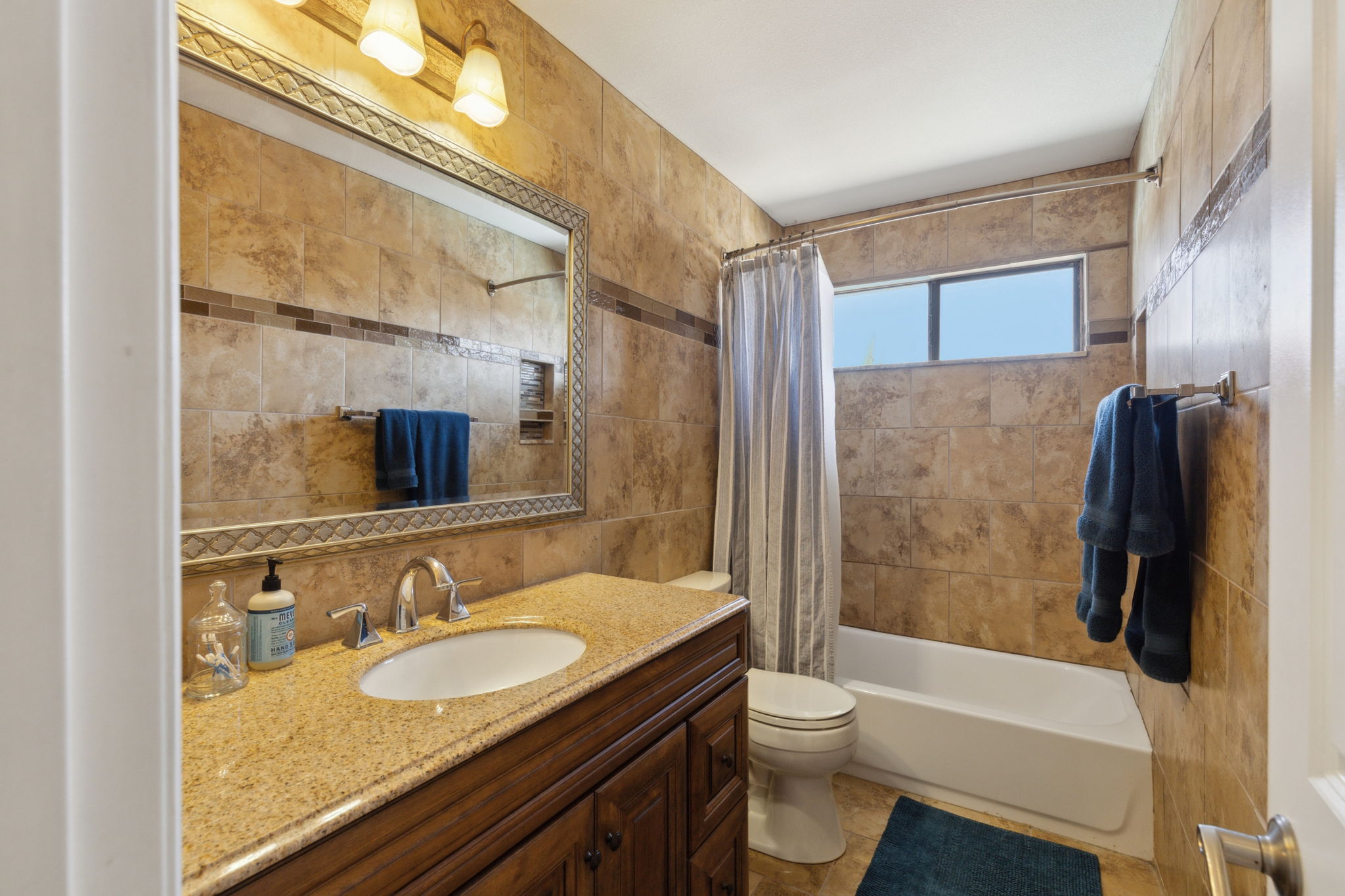 This is the updated, spacious and immaculate, upstairs bath!