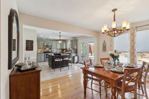 The attractive entry leads you to the Dining and the beautifully updated Kitchen!  Don't miss the views of the spectacular pool area.