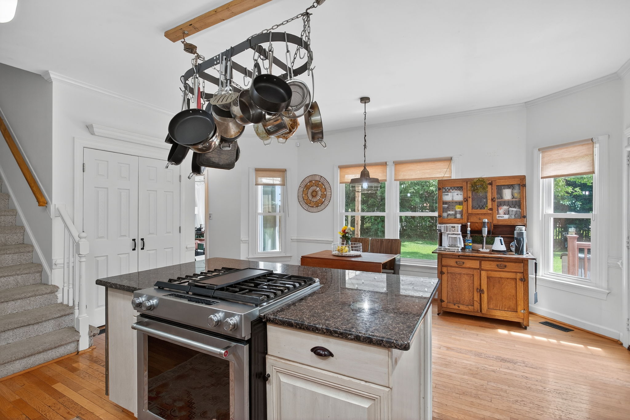 Flowing layout with an island at the heart of the home.