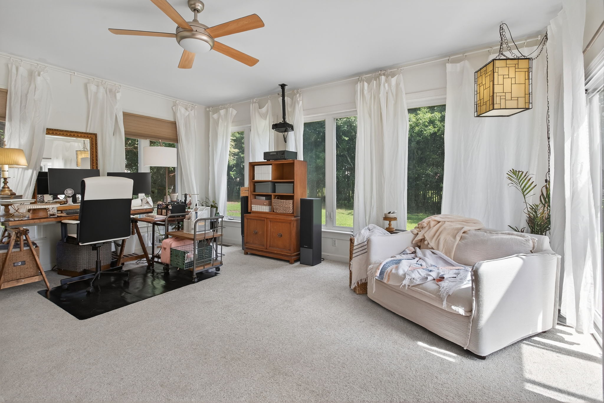 Expansive sunroom retreat with endless possibilities.