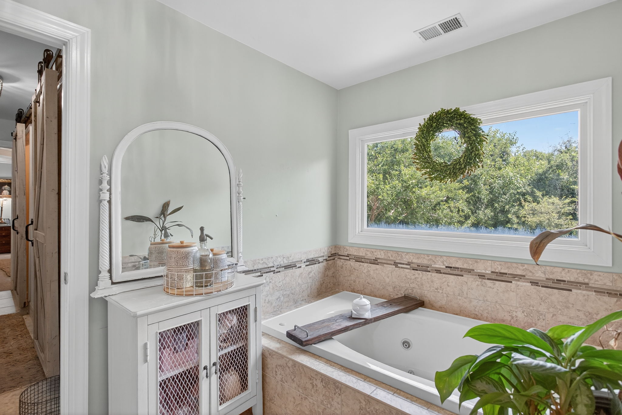 Dual vanities, dreamy soaking tub, total bliss.