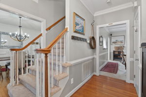 Welcoming, light-filled foyer sets the tone.
