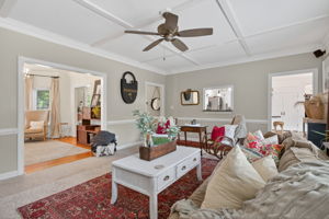 Spacious and inviting den flows seamlessly into the kitchen and living areas.