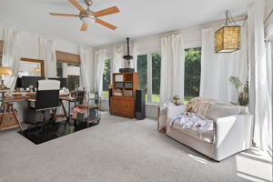 Expansive sunroom retreat with endless possibilities.
