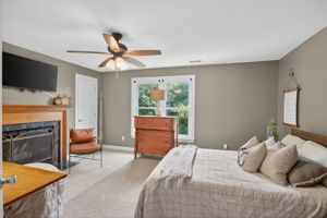 Oversized bedroom (1 of 6) with a fireplace—warm, inviting, and full of charm.
