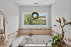 Soak, unwind, repeat—in your dreamy Primary Bathroom.