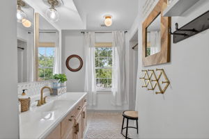 Fresh and functional bathroom, centrally located for easy use.