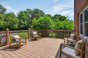 Low-maintenance composite deck just off the home, perfect for grilling, dining, or soaking up the sun.