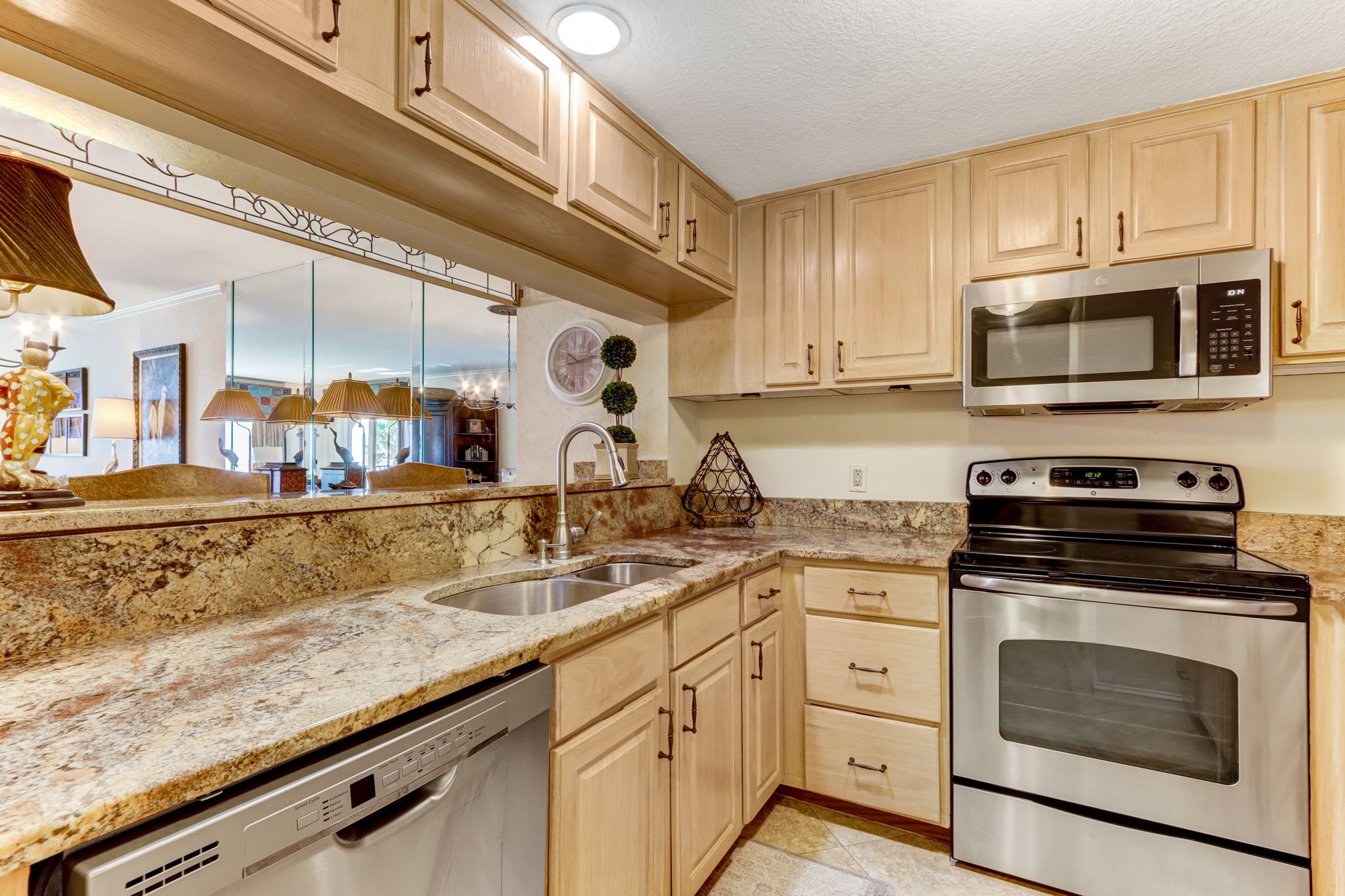 ...featuring granite counters and stainless steel appliances