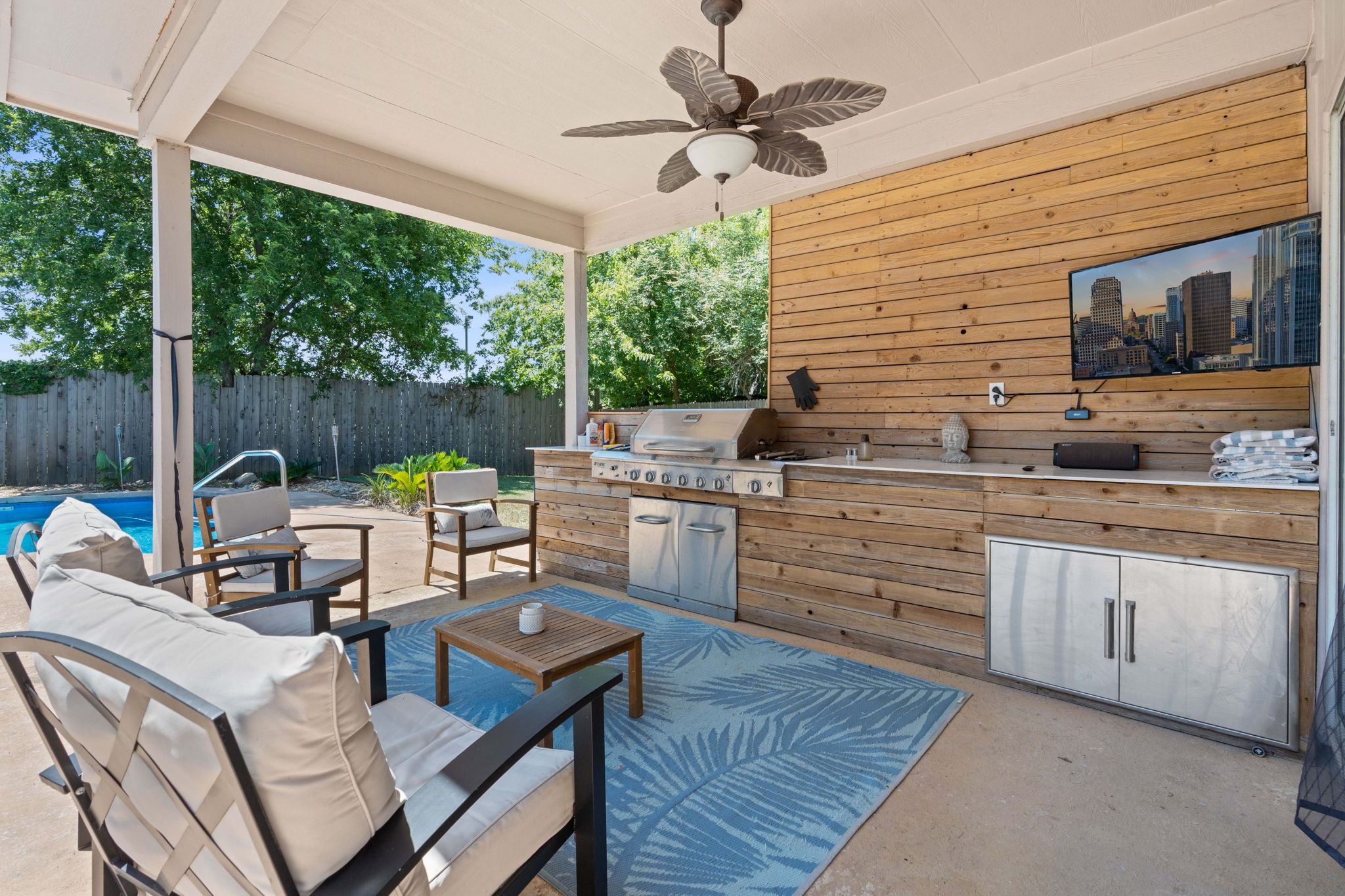 Covered Outdoor living with BBQ and TV Mount