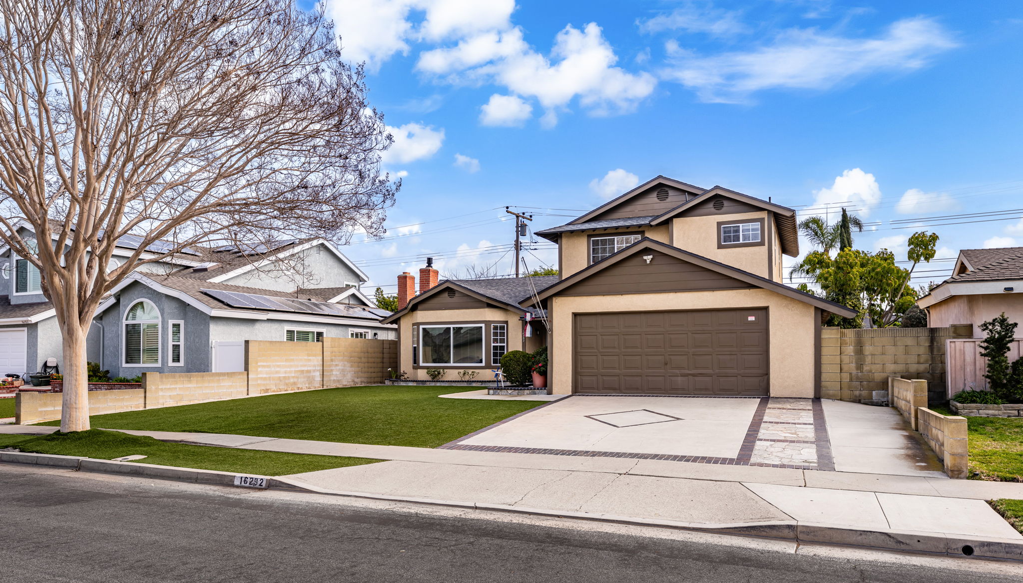 Incredible curb appeal with low maintenance artificial turf