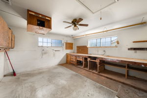 The fourth bedroom has been in use as a wood workshop; would easily be converted back into a sizable second primary bedroom