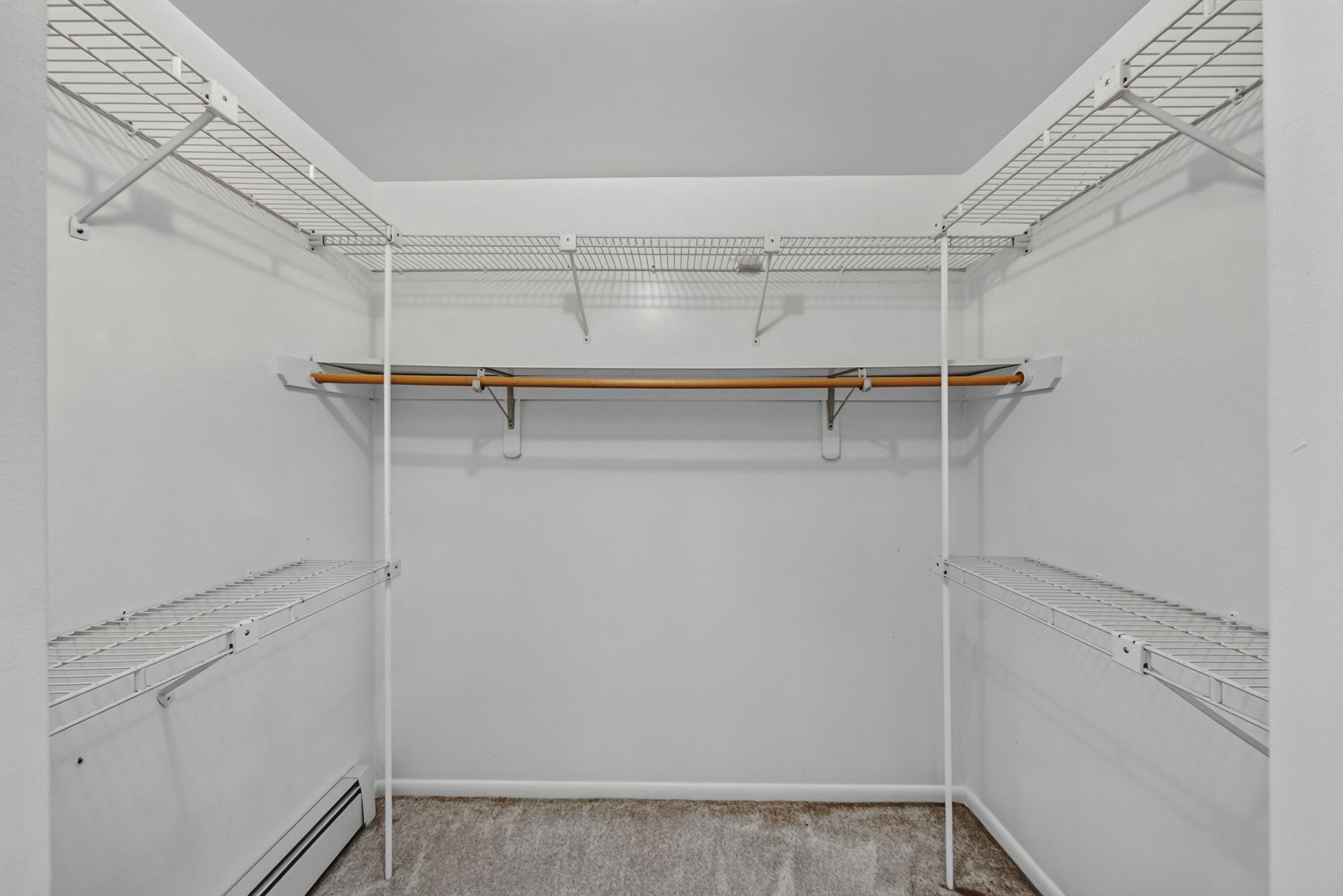 Primary Bedroom En Suite: Upstairs, the exceptionally spacious primary suite has room for a king-size bed and a comfortable sitting area. Storage is abundant with a walk-in closet and two additional closets, while the private primary bath offers generous space.