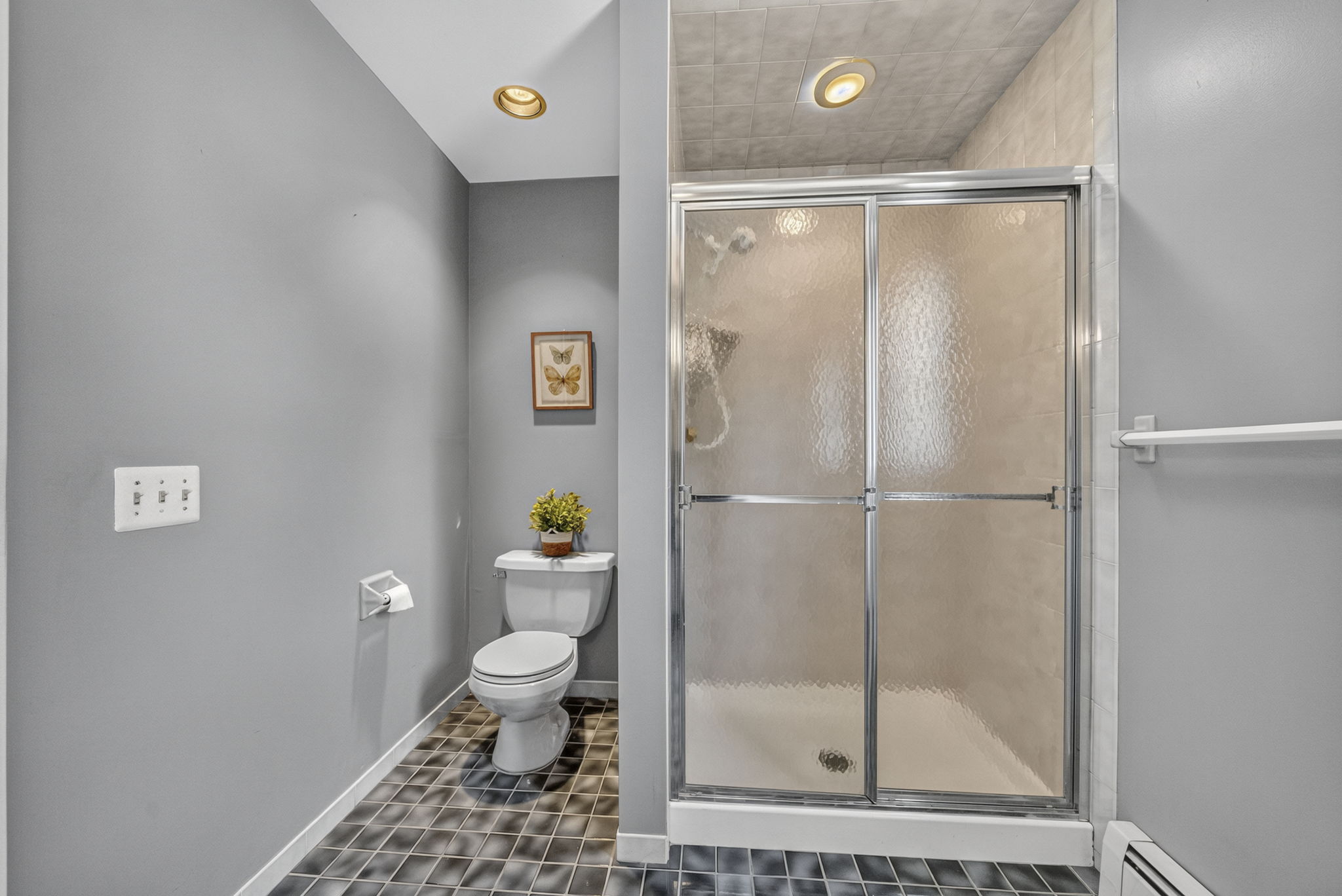 Primary Bedroom En Suite: Upstairs, the exceptionally spacious primary suite has room for a king-size bed and a comfortable sitting area. Storage is abundant with a walk-in closet and two additional closets, while the private primary bath offers generous space.
