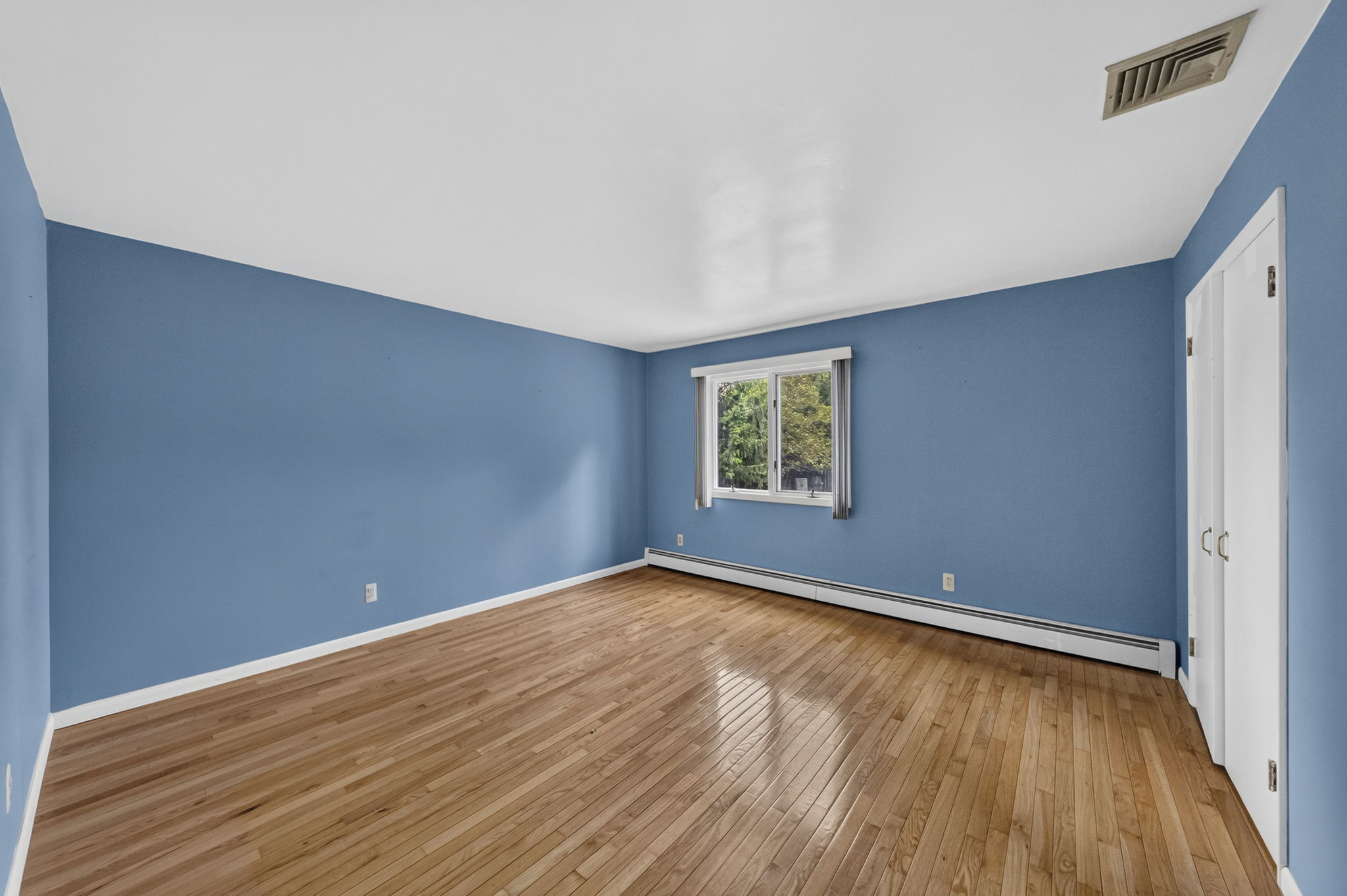 Bedroom #2 : Three additional well-sized bedrooms share a main bath featuring dual sinks and a separate shower and toilet area. A freshly painted second-floor laundry room keeps daily tasks conveniently close to the bedrooms. Mostly hardwood floors run throughout the home.