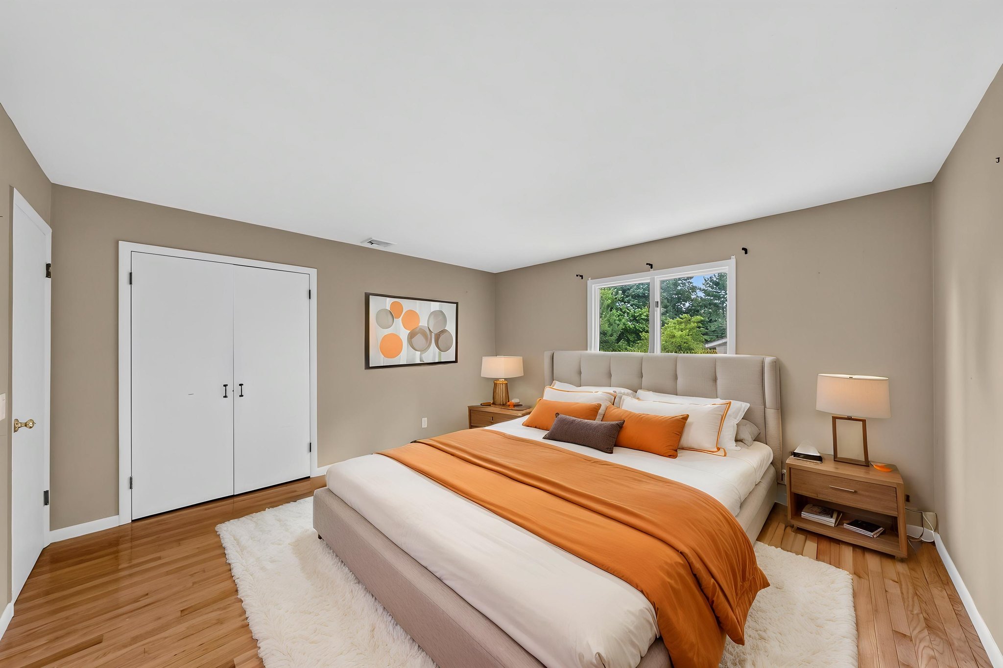 Bedroom #3-Virtually Staged: Three additional well-sized bedrooms share a main bath featuring dual sinks and a separate shower and toilet area. A freshly painted second-floor laundry room keeps daily tasks conveniently close to the bedrooms. Mostly hardwood floors run throughout the home.