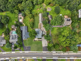 Welcome to 163 Oldham Road in Wayne, NJ, a deceptively spacious 4-bedroom, 2.5-bath home offering 3,204 square feet of living space on .9 acres. Generously sized rooms, mostly hardwood floors and a detached tandem garage accommodating up to five cars make this property a truly distinctive find.