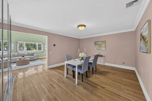 The formal dining room offers concealed storage, adding function without sacrificing style.