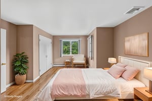 Bedroom #4-Virtually Staged: Three additional well-sized bedrooms share a main bath featuring dual sinks and a separate shower and toilet area. A freshly painted second-floor laundry room keeps daily tasks conveniently close to the bedrooms. Mostly hardwood floors run throughout the home.