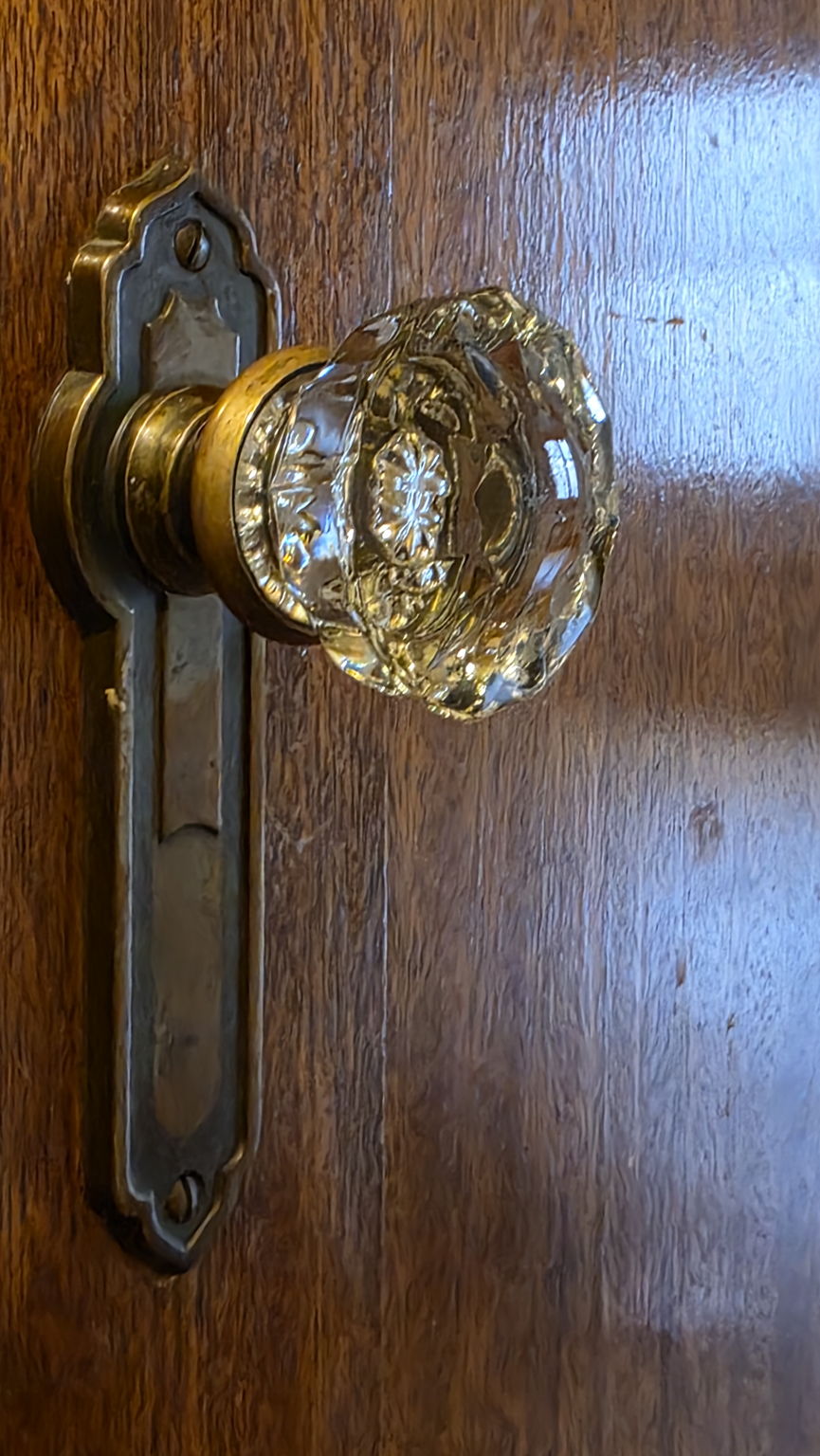 Vintage glass doorknobs add sparkle and charm throughout this classic Capitol Hill home.