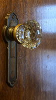 Vintage glass doorknobs add sparkle and charm throughout this classic Capitol Hill home.