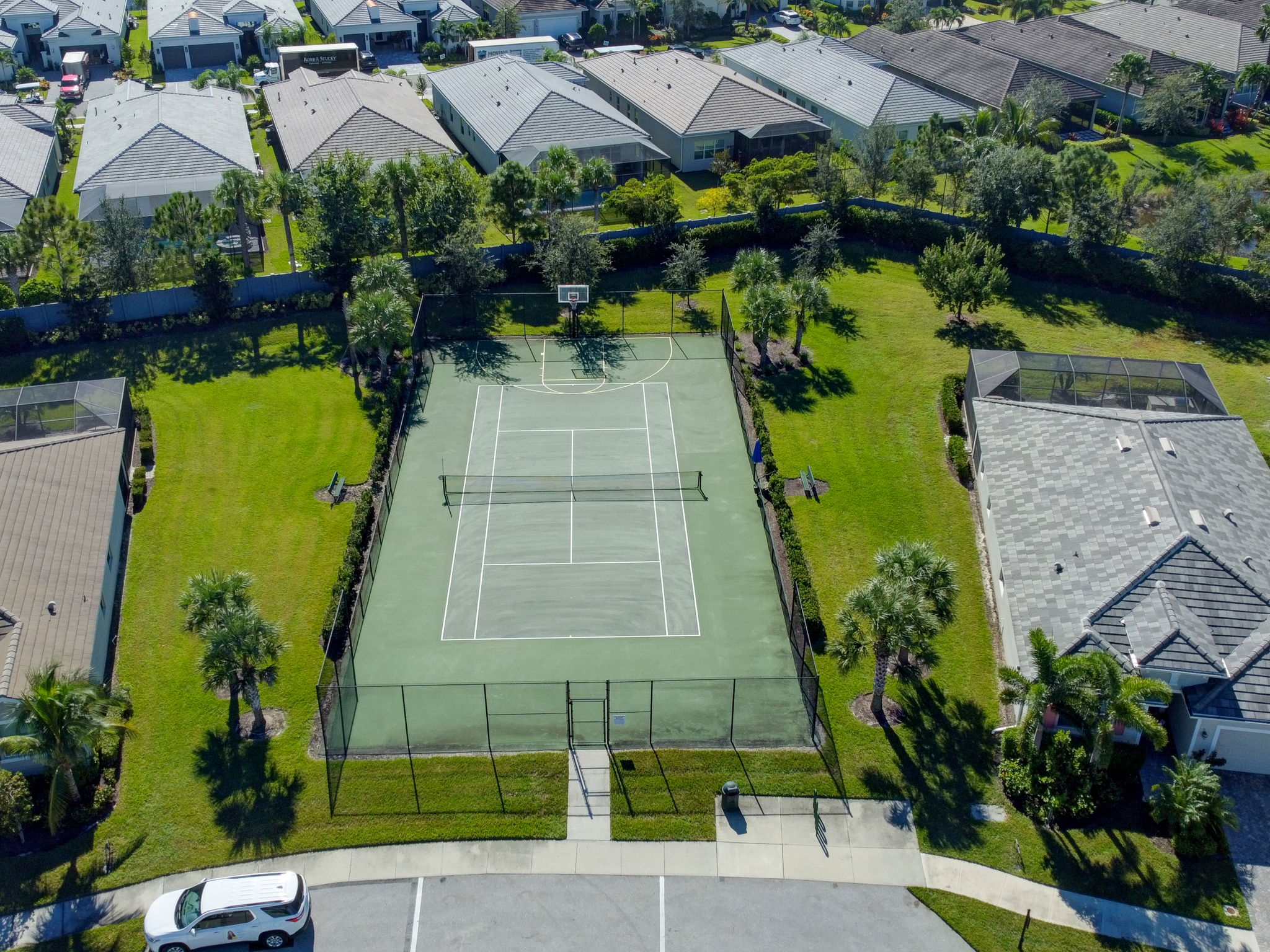 Tennis Court and Basket ball Hoop in Community