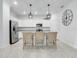 Kitchen with Granite counters and walk-in Pantry