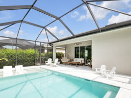 Covered Lanai leads out to pool