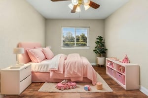 Bedroom 1 virtually staged.jpeg