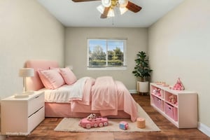 Bedroom 1 virtually staged.jpeg