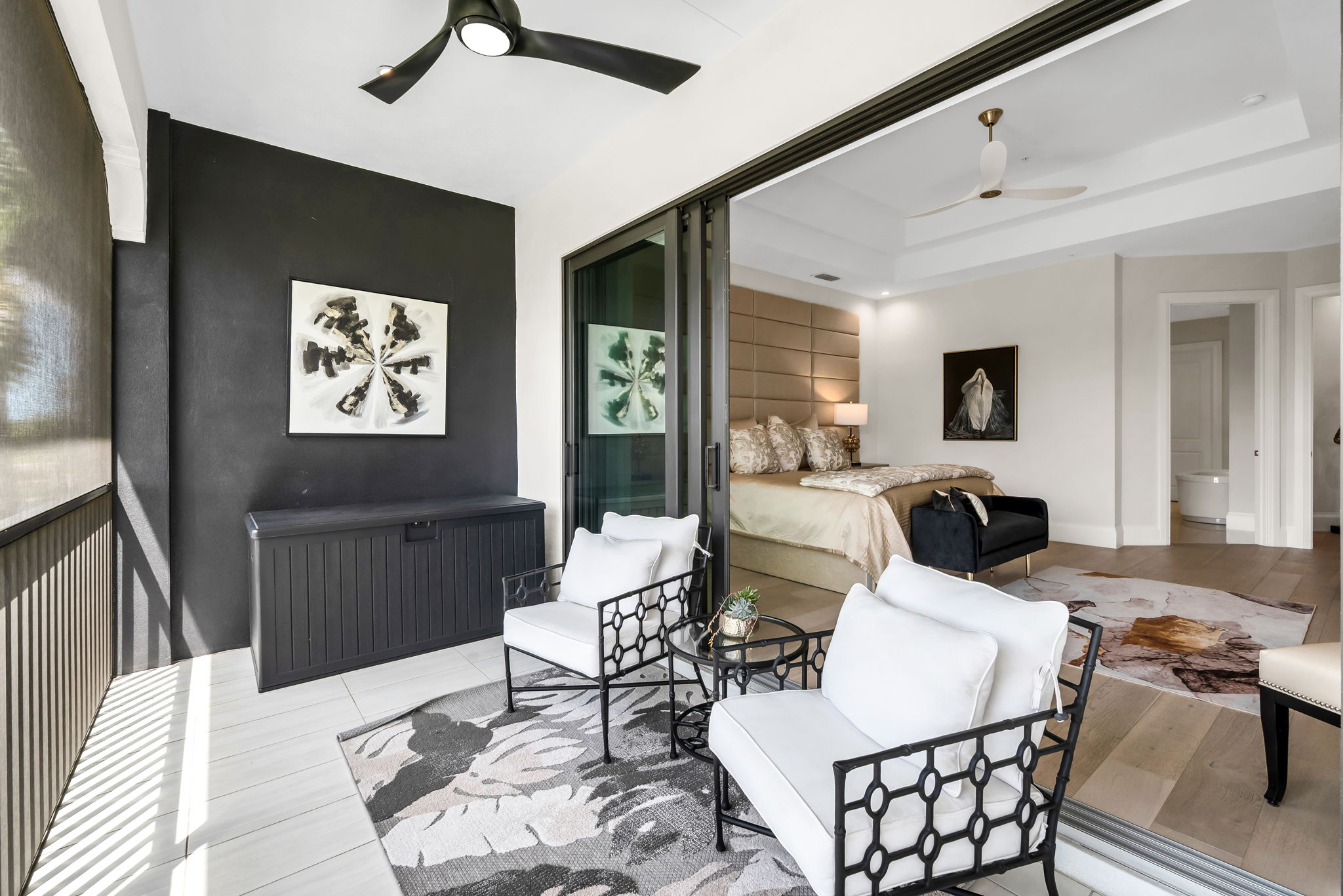 View 2 - Primary Suite with direct access to an enlarged lanai overlooking the tranquil waterway.