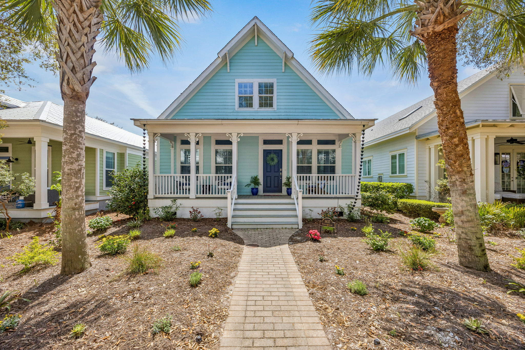 The generous front porch extends the living experience outdoors and sets the tone for what’s inside.