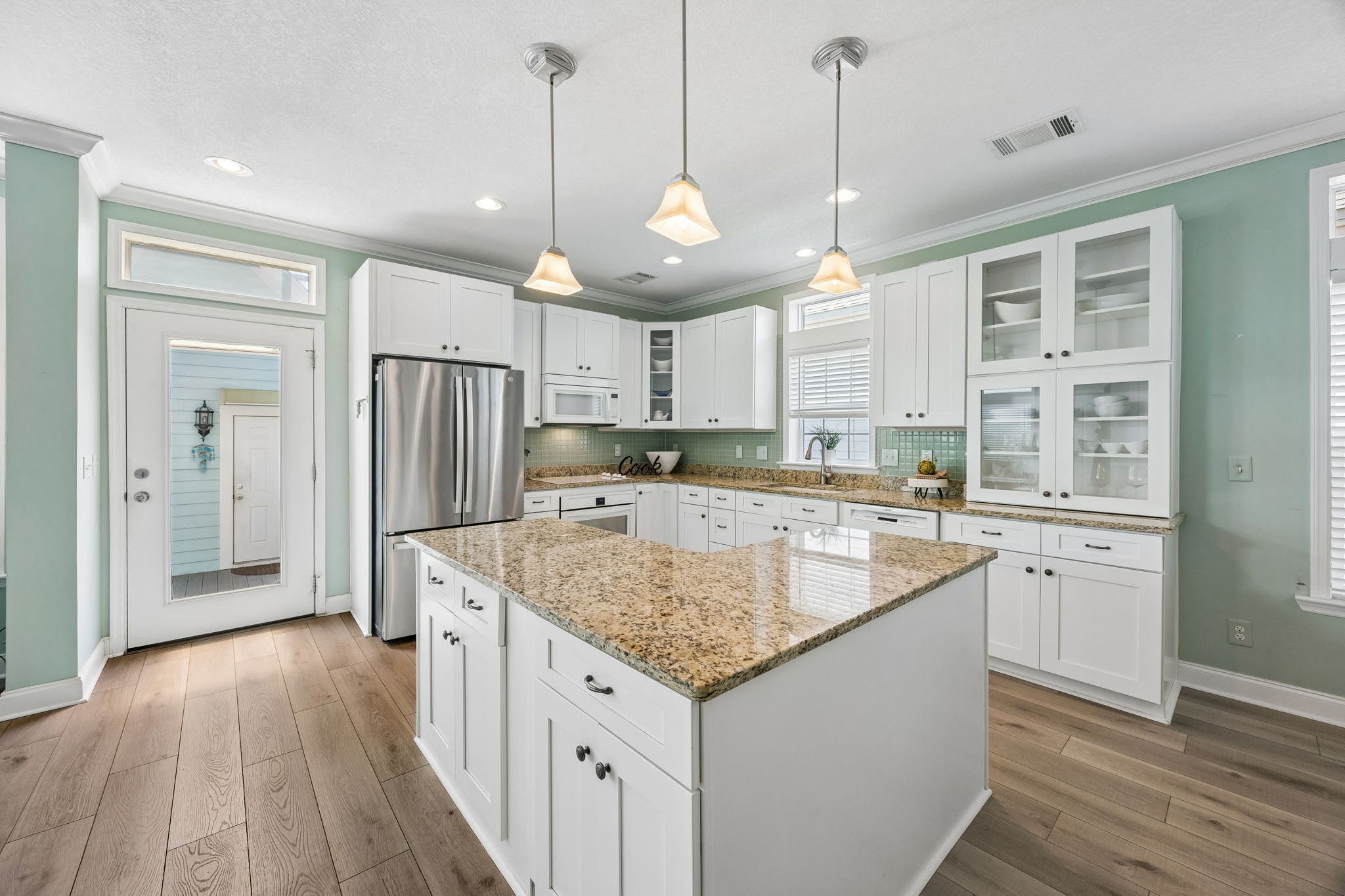 Crisp white finishes keep the look fresh and timeless ...