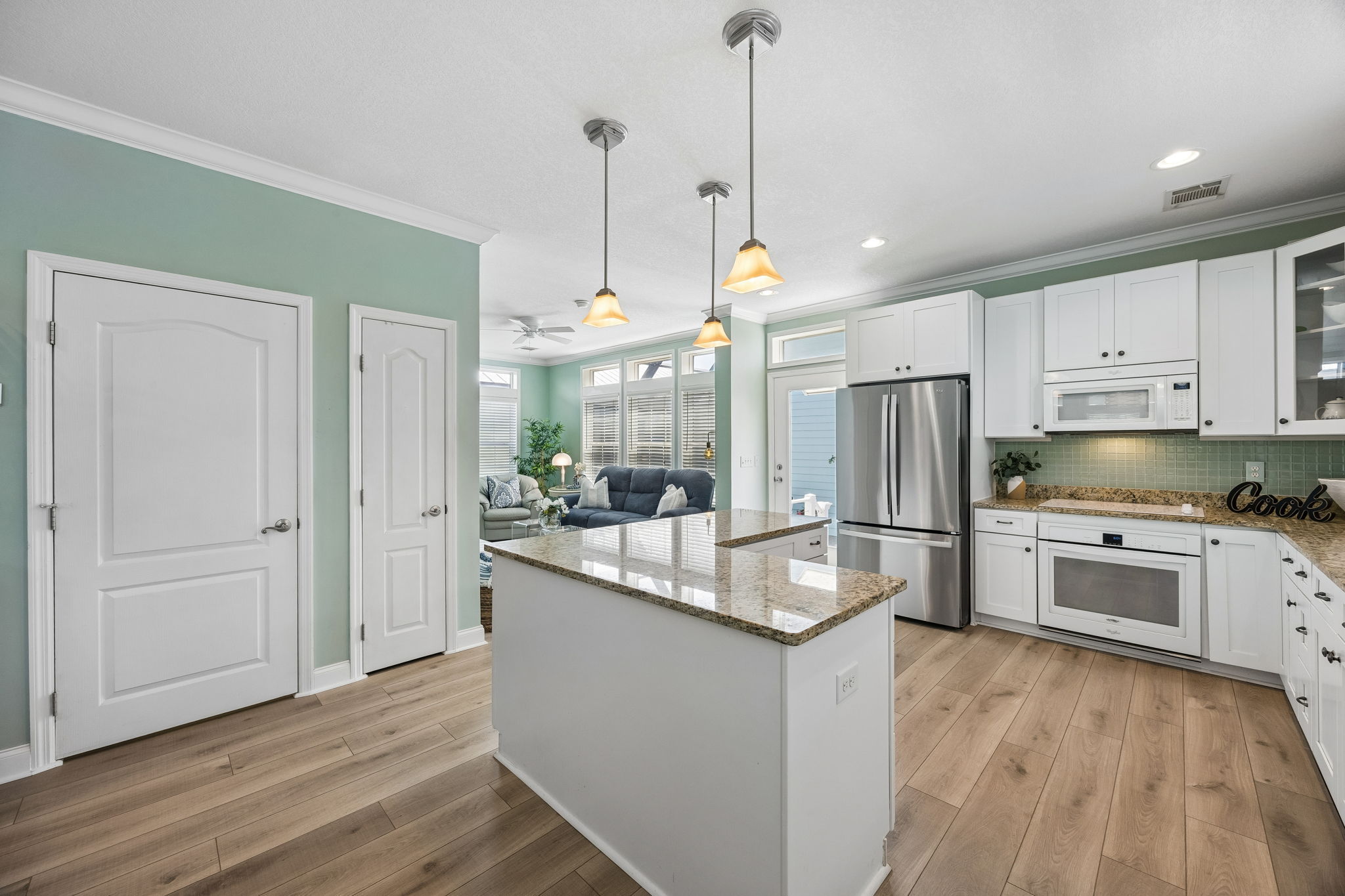 ... while the large island keeps everything centered around connection and ease.