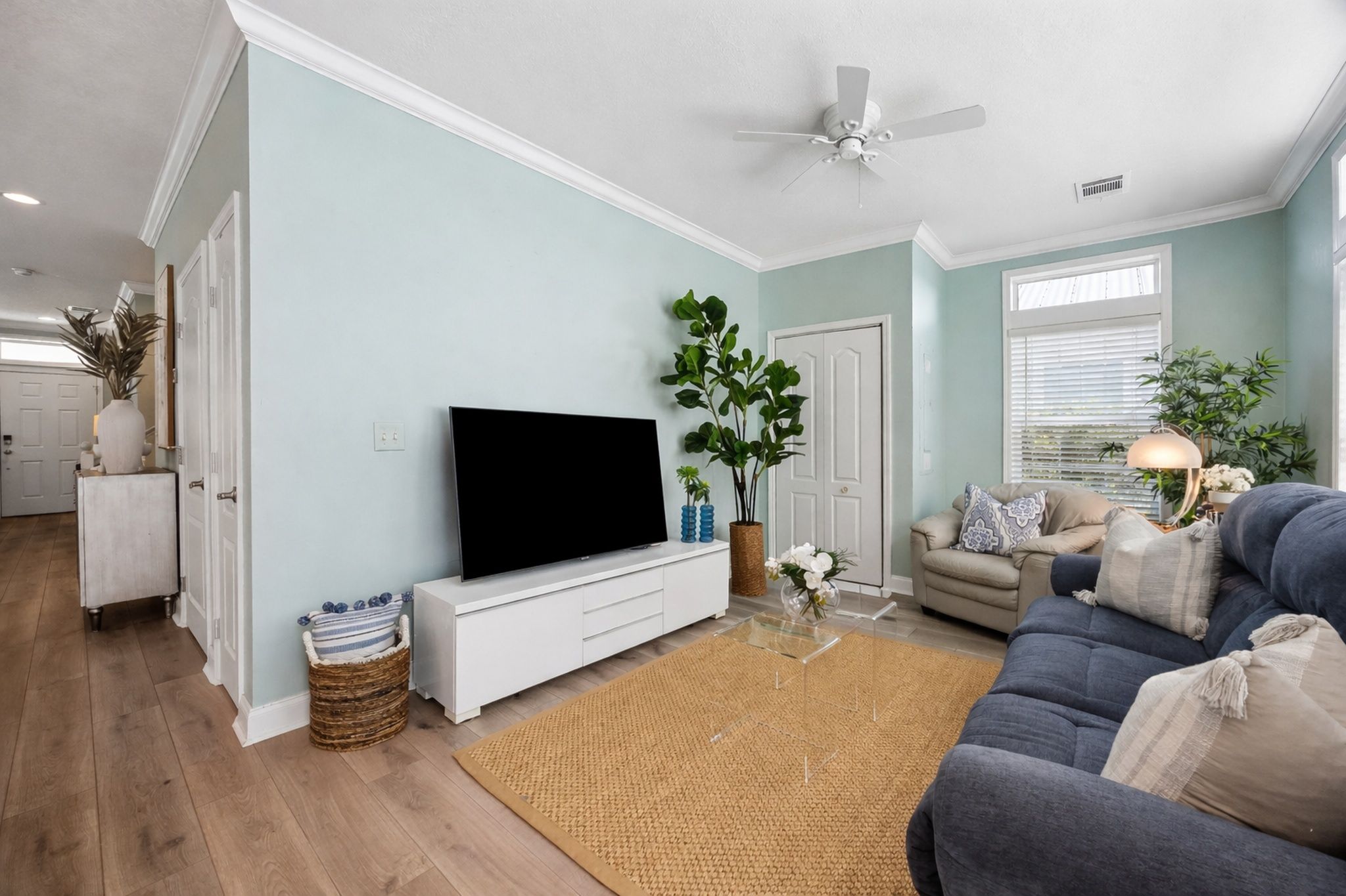 This secondary living area adds flexibility to the main level ...