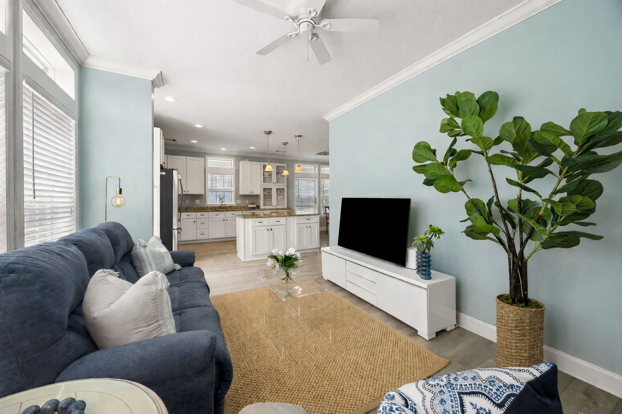 Wrapped in windows and open to the kitchen ...