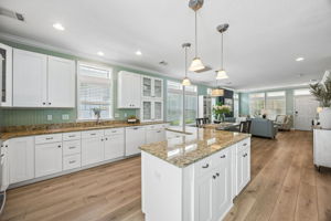 Inside, the home opens beautifully ...