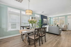 Nearby, the dining area sits right at the center of it all ...