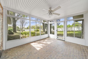 Sunroom with brick pavers